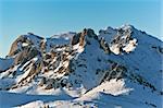 winter mountain landscape with a blue sky