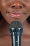 Close up of female lips with microphone
