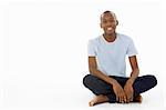 Teenage Boy Sitting In Studio