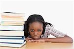 Bored student leaning on her hands against a white background