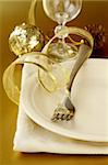 Beautiful and elegant gold place setting for christmas or celebrations