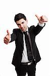 Young businessman with thumbs up isolated over a white background