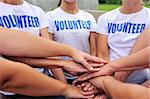 volunteer group hands together showing unity