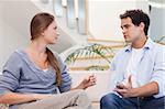 Couple having an argument in their living room