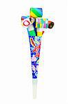 Multicolor party blowers inside paper horn on white background