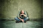 tired man after street fight ,selective focus on head