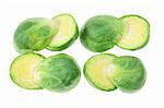 Slices of Brussel Sprouts on White Background