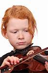 Portrait of a red haired girl playing violin