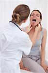 Patient showing tongue to doctor