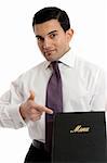 A smartly dressed waiter or restaurnt owner pointing to a menu.  Could also be a presentation, brochure or other business item.