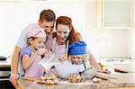Happy family having a great time baking together