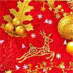 Christmas card background golden and red with baubles stars santa reindeer