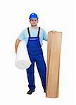 Worker ready to lay laminate flooring - isolated