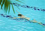 Woman swimming underwater