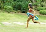 Girl running with ring around waist