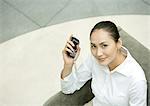 Businesswoman holding smart phone