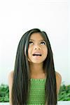 Girl looking up, open mouth, portrait