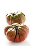 Two heirloom tomatoes, close-up