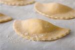 Fresh homemade mezzaluna ravioli