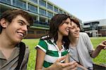 High school friends hanging out together, pointing and laughing