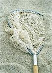 Fishing net on sand