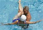 Mature couple in pool