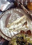 Stuffed brie on plate, high angle view
