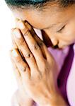 Woman with eyes closed, praying, close-up