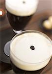 Two glasses of Irish coffee, elevated view, close-up