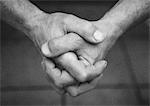 Hands together, close-up, b&w