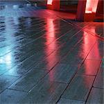 Light reflected on wet flagstones