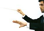 Orchestra conductor, side view