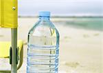 Bottle of water on beach