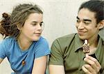 Young couple eating ice cream