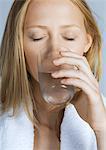 Woman drinking glass of water