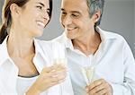 Couple holding champagne flutes