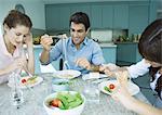 Family having meal together