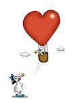 Woman looking up at man in heart-shaped hot air balloon