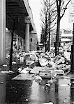 France, Paris, piles of trash next to street