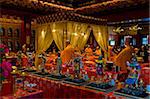 Chanting in the Hundred Dragons hall in the Buddha Tooth Relic temple in Singapore, Southeast Asia, Asia