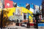 Buildings painted in colourful Afro-Cuban art, masterminded by artist Salvador Gonzalez Escalona, Callejon de Hamel, Havana, Cuba, West Indies, Central America