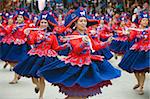 Women dancing in parade at Oruro Carnival, Oruro, Bolivia, South America