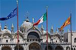 St. Marks with the flags of the EU, Italy, and the Venice Lion, St. Marks Square, Venice, UNESCO World Heritage Site, Veneto, Italy, Europe