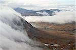 Clouds and mountains and tundra in the fall, Katmai Peninsula, Alaska, United States of America, North America