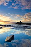 Bamburgh Castle at dawn in November, Bamburgh, Northumberland, England, United Kingdom, Europe