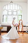 Bride Looking in Mirror