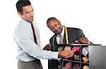 Man selecting neckties with tailor standing besides