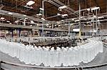 Bottled water on conveyor at bottling plant