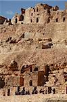 Troglodyte cave dwellings and granary niches known as ghorfas, hillside Berber village of Chenini, Tunisia, North Africa, Africa