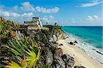 Tulum beach and El Castillo temple at ancient Mayan site of Tulum, Tulum, Quintana Roo, Mexico, North America